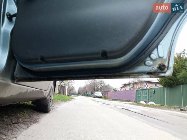 Синий Дэу Ланос, объемом двигателя 1.6 л и пробегом 310 тыс. км за 2200 $, фото 17 на Automoto.ua