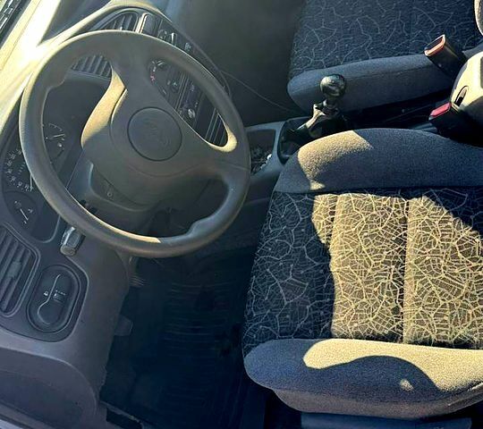 Синий Дэу Ланос, объемом двигателя 1.5 л и пробегом 122 тыс. км за 2600 $, фото 2 на Automoto.ua