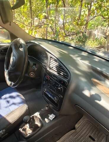 Синий Дэу Ланос, объемом двигателя 1.5 л и пробегом 170 тыс. км за 1850 $, фото 9 на Automoto.ua