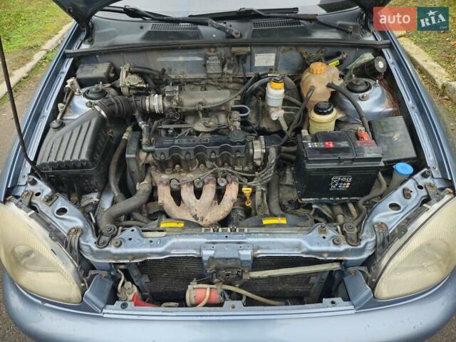 Синій Деу Ланос, об'ємом двигуна 1.5 л та пробігом 249 тис. км за 2350 $, фото 25 на Automoto.ua