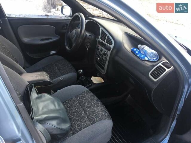 Синий Дэу Ланос, объемом двигателя 1.5 л и пробегом 140 тыс. км за 3400 $, фото 11 на Automoto.ua