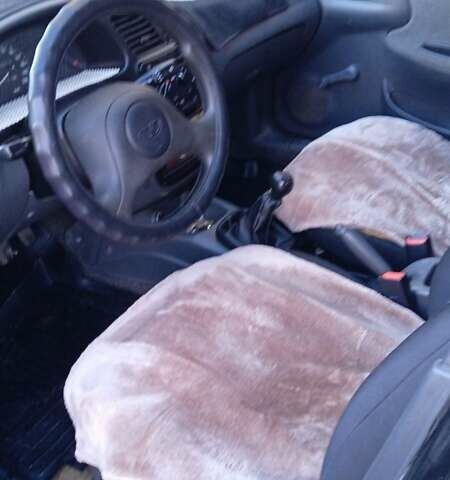 Синий Дэу Ланос, объемом двигателя 1.5 л и пробегом 343 тыс. км за 2300 $, фото 13 на Automoto.ua