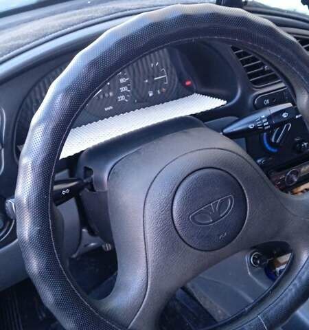 Синий Дэу Ланос, объемом двигателя 1.5 л и пробегом 343 тыс. км за 2300 $, фото 25 на Automoto.ua