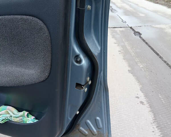 Синий Дэу Ланос, объемом двигателя 1.6 л и пробегом 310 тыс. км за 2200 $, фото 14 на Automoto.ua