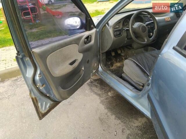 Синий Дэу Ланос, объемом двигателя 1.5 л и пробегом 200 тыс. км за 800 $, фото 14 на Automoto.ua