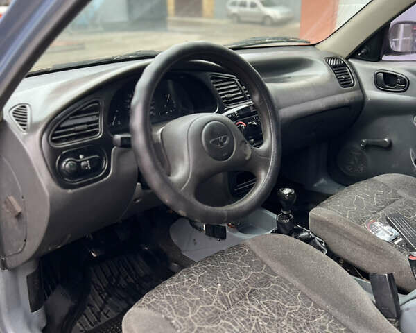 Синий Дэу Ланос, объемом двигателя 1.5 л и пробегом 200 тыс. км за 2150 $, фото 4 на Automoto.ua