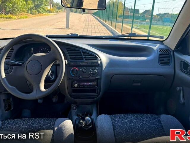 Синий Дэу Ланос, объемом двигателя 1.5 л и пробегом 122 тыс. км за 2600 $, фото 3 на Automoto.ua