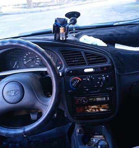 Синий Дэу Ланос, объемом двигателя 1.5 л и пробегом 343 тыс. км за 2300 $, фото 12 на Automoto.ua