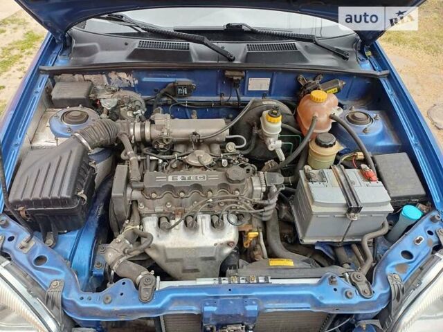 Синій Деу Ланос, об'ємом двигуна 1.5 л та пробігом 193 тис. км за 3100 $, фото 22 на Automoto.ua
