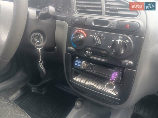 Синий Дэу Ланос, объемом двигателя 1.5 л и пробегом 100 тыс. км за 2750 $, фото 3 на Automoto.ua