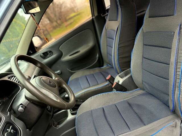 Синий Дэу Ланос, объемом двигателя 1.4 л и пробегом 75 тыс. км за 1999 $, фото 6 на Automoto.ua