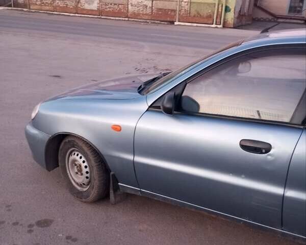 Синий Дэу Ланос, объемом двигателя 1.3 л и пробегом 290 тыс. км за 1400 $, фото 7 на Automoto.ua