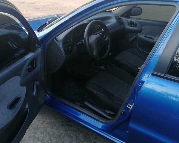 Синий Дэу Ланос, объемом двигателя 1.5 л и пробегом 126 тыс. км за 3300 $, фото 3 на Automoto.ua