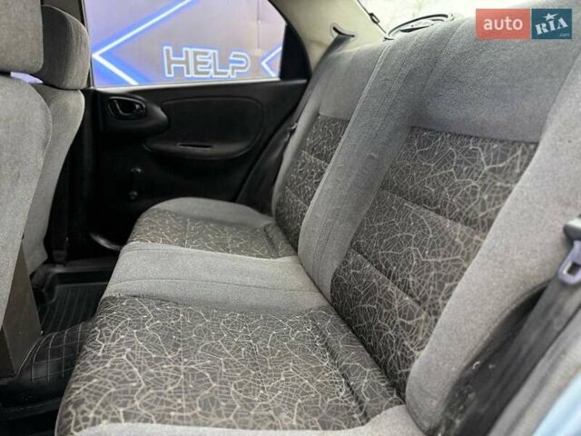 Синий Дэу Ланос, объемом двигателя 1.5 л и пробегом 180 тыс. км за 3299 $, фото 8 на Automoto.ua