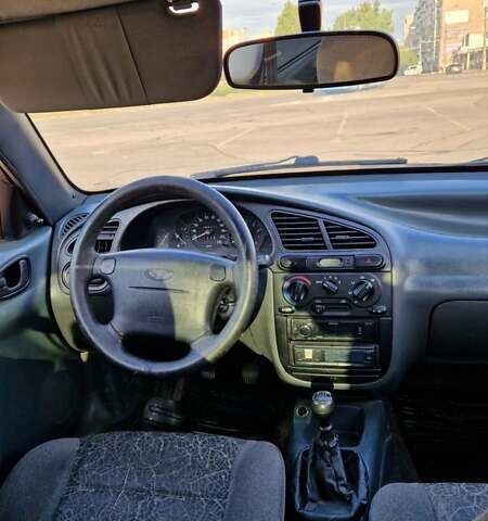 Синий Дэу Ланос, объемом двигателя 1.6 л и пробегом 266 тыс. км за 3100 $, фото 9 на Automoto.ua