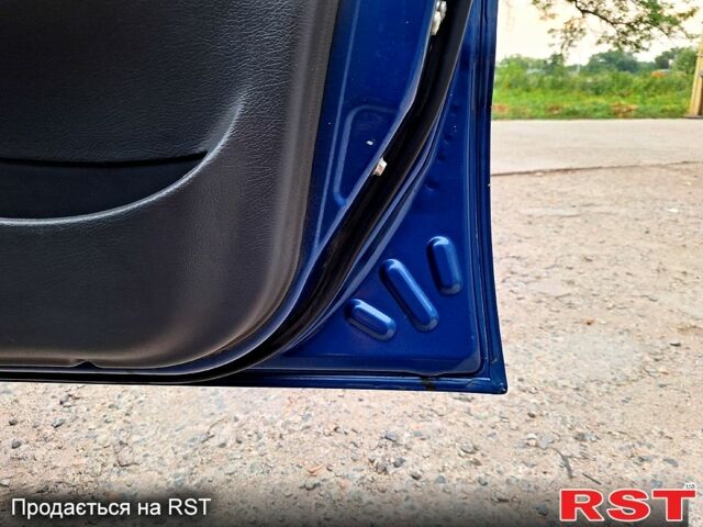 Синий Дэу Ланос, объемом двигателя 1.5 л и пробегом 86 тыс. км за 2600 $, фото 7 на Automoto.ua