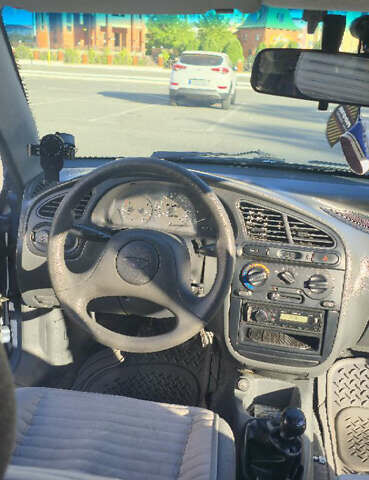 Синий Дэу Ланос, объемом двигателя 1.5 л и пробегом 318 тыс. км за 2700 $, фото 7 на Automoto.ua