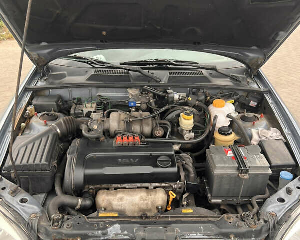 Синий Дэу Ланос, объемом двигателя 1.6 л и пробегом 310 тыс. км за 2200 $, фото 9 на Automoto.ua