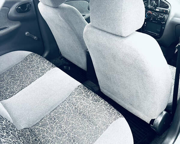 Синий Дэу Ланос, объемом двигателя 1.6 л и пробегом 310 тыс. км за 2200 $, фото 7 на Automoto.ua