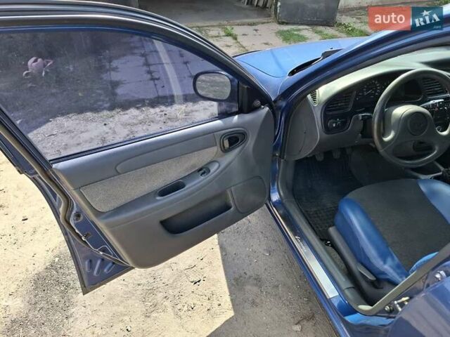 Синій Деу Ланос, об'ємом двигуна 1.5 л та пробігом 153 тис. км за 3500 $, фото 34 на Automoto.ua