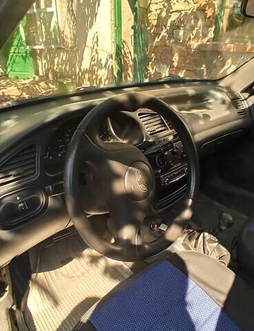 Синий Дэу Ланос, объемом двигателя 1.5 л и пробегом 170 тыс. км за 1850 $, фото 3 на Automoto.ua
