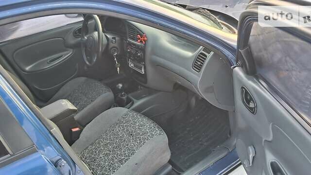 Синий Дэу Ланос, объемом двигателя 1.5 л и пробегом 200 тыс. км за 900 $, фото 2 на Automoto.ua