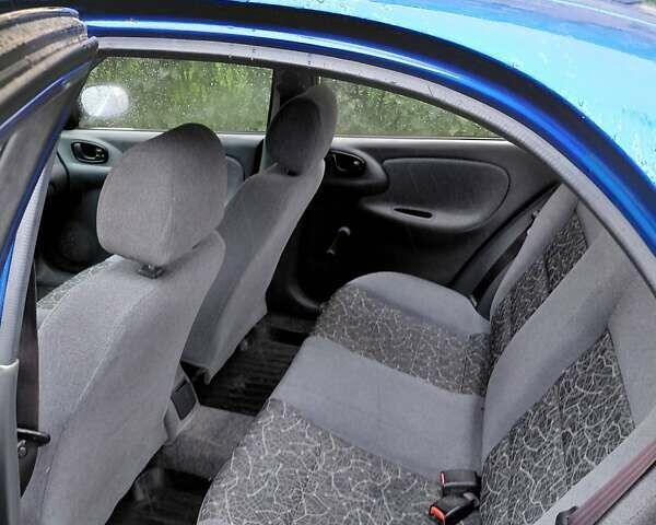Синій Деу Ланос, об'ємом двигуна 1.5 л та пробігом 143 тис. км за 2750 $, фото 17 на Automoto.ua