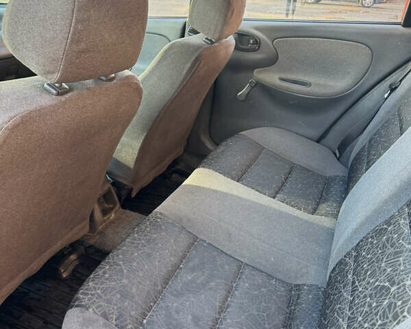 Синій Деу Ланос, об'ємом двигуна 1.5 л та пробігом 346 тис. км за 1050 $, фото 10 на Automoto.ua