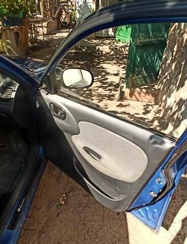 Синий Дэу Ланос, объемом двигателя 1.5 л и пробегом 170 тыс. км за 1850 $, фото 11 на Automoto.ua