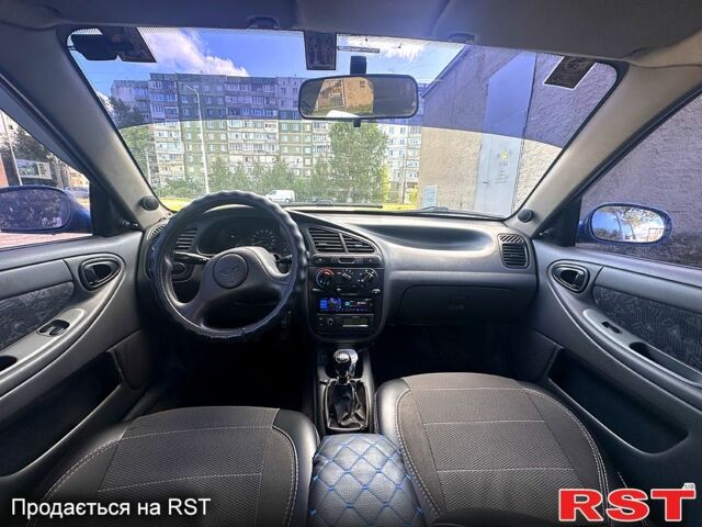 Синій Деу Ланос, об'ємом двигуна 1.5 л та пробігом 179 тис. км за 2650 $, фото 8 на Automoto.ua