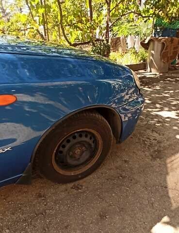 Синий Дэу Ланос, объемом двигателя 1.5 л и пробегом 170 тыс. км за 1850 $, фото 13 на Automoto.ua