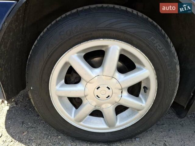 Синій Деу Ланос, об'ємом двигуна 1.5 л та пробігом 153 тис. км за 3500 $, фото 37 на Automoto.ua