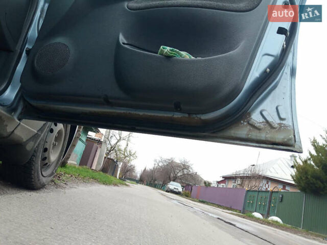 Синий Дэу Ланос, объемом двигателя 1.6 л и пробегом 310 тыс. км за 2200 $, фото 16 на Automoto.ua