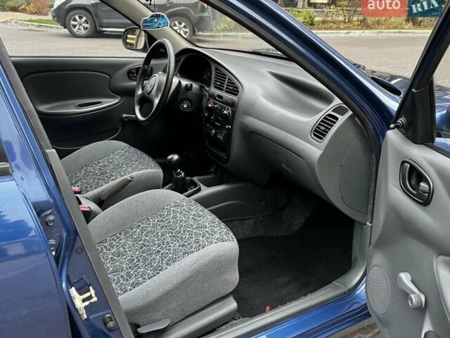 Синій Деу Ланос, об'ємом двигуна 1.5 л та пробігом 59 тис. км за 4200 $, фото 48 на Automoto.ua