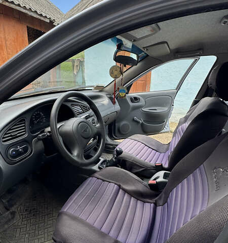 Синій Деу Ланос, об'ємом двигуна 1.5 л та пробігом 150 тис. км за 1800 $, фото 13 на Automoto.ua