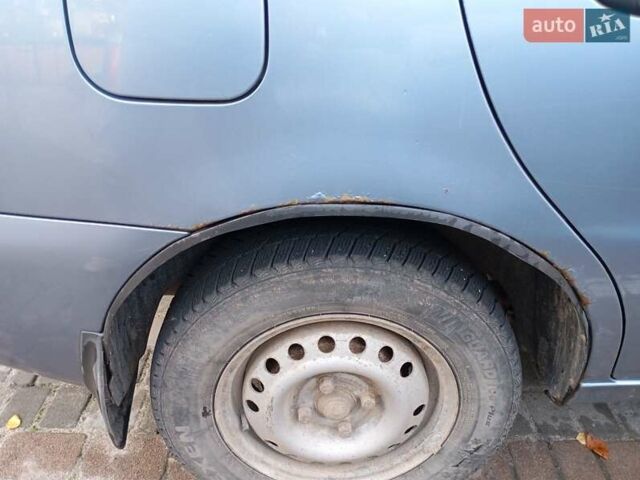 Синій Деу Ланос, об'ємом двигуна 1.39 л та пробігом 167 тис. км за 2400 $, фото 12 на Automoto.ua