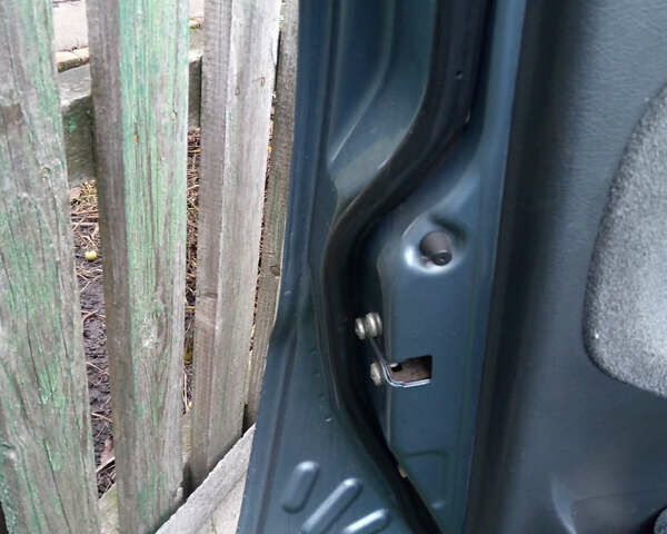 Синий Дэу Ланос, объемом двигателя 1.6 л и пробегом 310 тыс. км за 2200 $, фото 13 на Automoto.ua