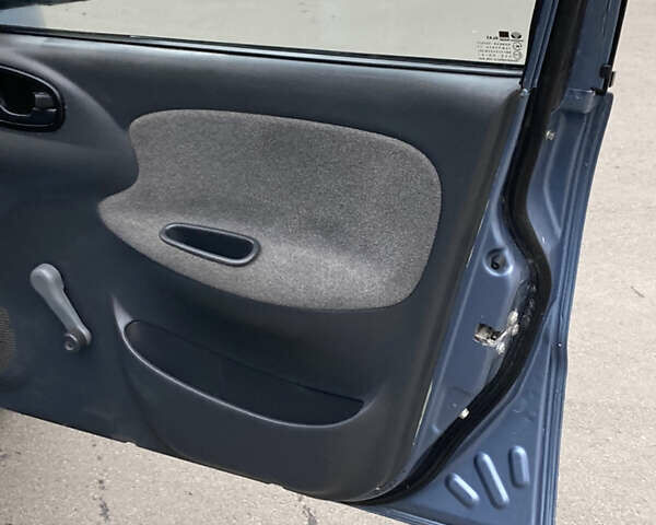 Синий Дэу Ланос, объемом двигателя 1.5 л и пробегом 200 тыс. км за 2200 $, фото 7 на Automoto.ua