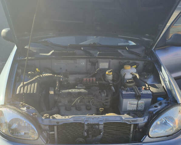 Синий Дэу Ланос, объемом двигателя 1.5 л и пробегом 318 тыс. км за 2700 $, фото 4 на Automoto.ua