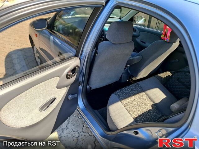Синий Дэу Ланос, объемом двигателя 1.5 л и пробегом 155 тыс. км за 2600 $, фото 3 на Automoto.ua