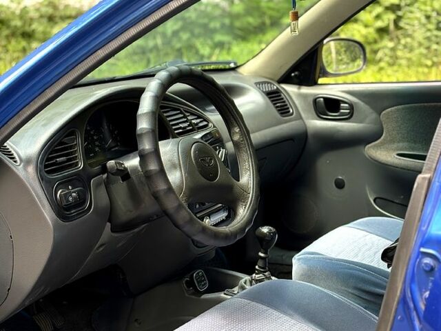 Синій Деу Ланос, об'ємом двигуна 1.4 л та пробігом 197 тис. км за 1850 $, фото 7 на Automoto.ua