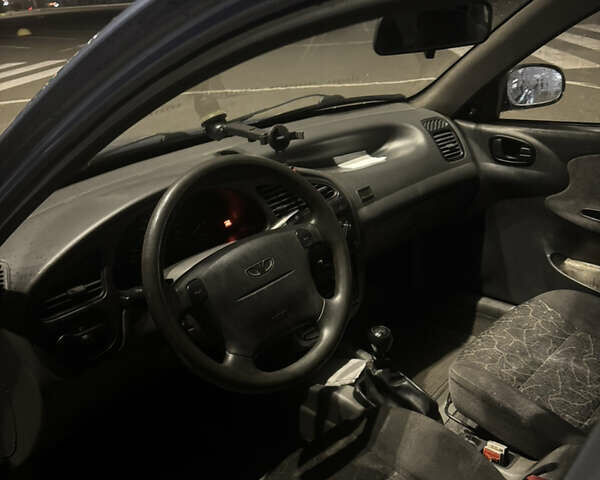 Синий Дэу Ланос, объемом двигателя 1.6 л и пробегом 460 тыс. км за 2200 $, фото 2 на Automoto.ua