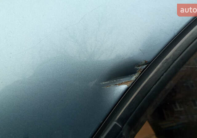 Синий Дэу Ланос, объемом двигателя 1.6 л и пробегом 310 тыс. км за 2200 $, фото 12 на Automoto.ua