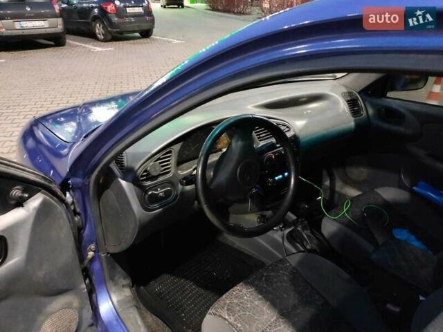 Синий Дэу Ланос, объемом двигателя 1.5 л и пробегом 214 тыс. км за 2100 $, фото 4 на Automoto.ua