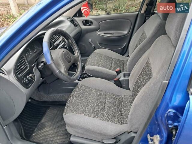 Синий Дэу Ланос, объемом двигателя 1.5 л и пробегом 360 тыс. км за 2250 $, фото 7 на Automoto.ua