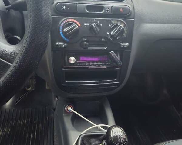 Синій Деу Ланос, об'ємом двигуна 1.5 л та пробігом 249 тис. км за 2350 $, фото 26 на Automoto.ua