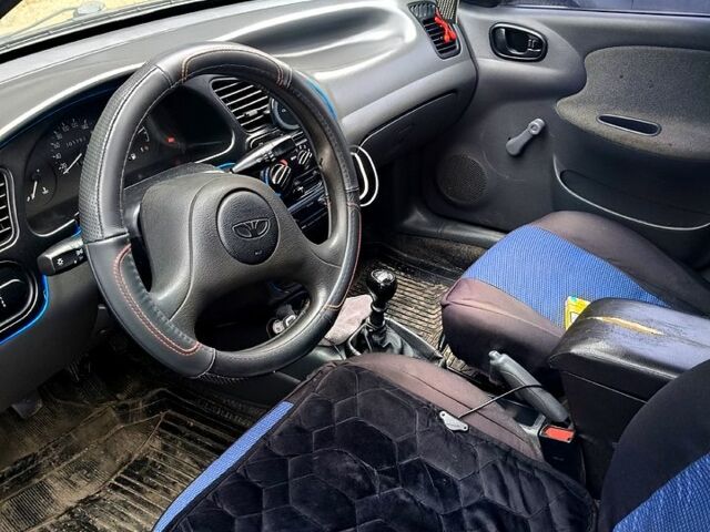 Синий Дэу Ланос, объемом двигателя 1.5 л и пробегом 201 тыс. км за 2300 $, фото 3 на Automoto.ua