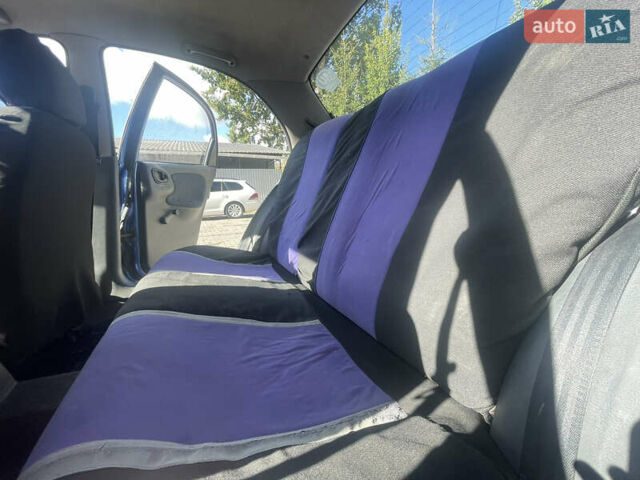 Синий Дэу Ланос, объемом двигателя 1.5 л и пробегом 102 тыс. км за 2600 $, фото 6 на Automoto.ua