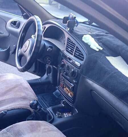 Синий Дэу Ланос, объемом двигателя 1.5 л и пробегом 343 тыс. км за 2300 $, фото 35 на Automoto.ua