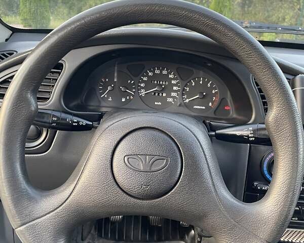 Синий Дэу Ланос, объемом двигателя 1.5 л и пробегом 162 тыс. км за 2750 $, фото 19 на Automoto.ua